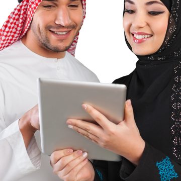 Arab Couple Looking at Tablet