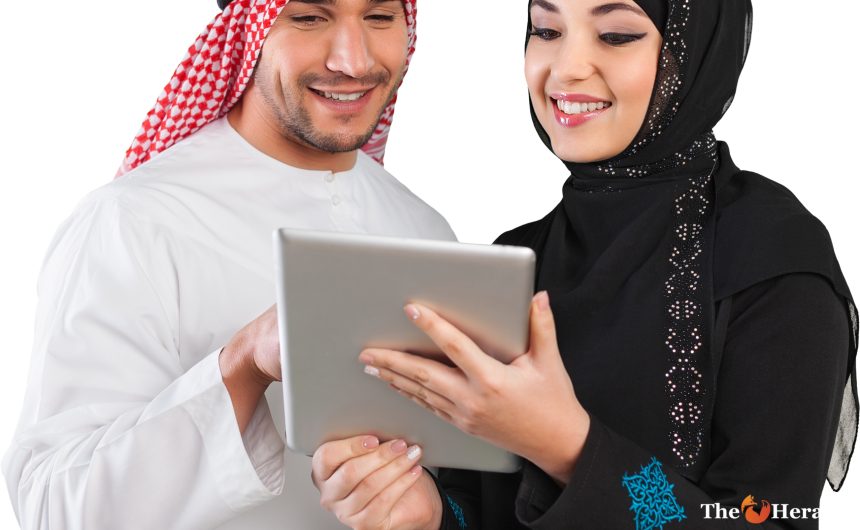Arab Couple Looking at Tablet