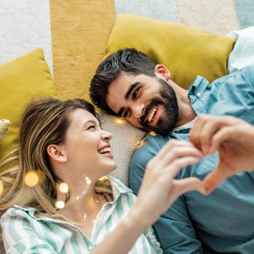 Loving young couple at home